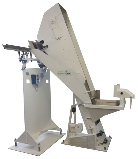 Bunkerelevator mit Sortierschwingrinne für Kfz-Ventile bunkerelevator mit sortierschwingrinne